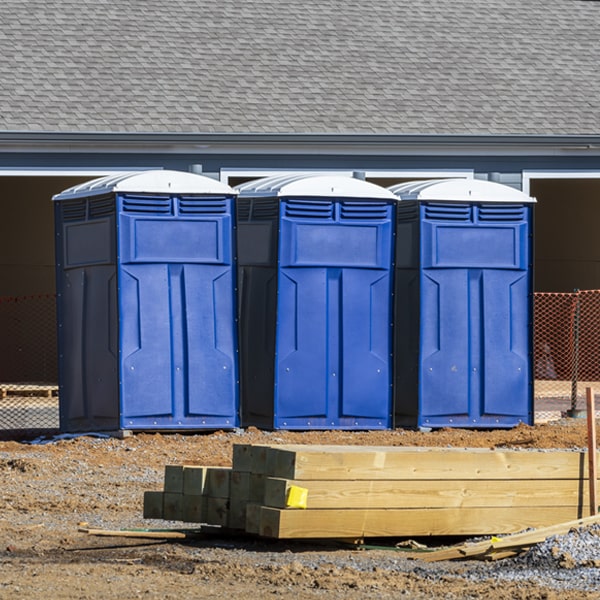 what is the cost difference between standard and deluxe porta potty rentals in Lone Rock IA